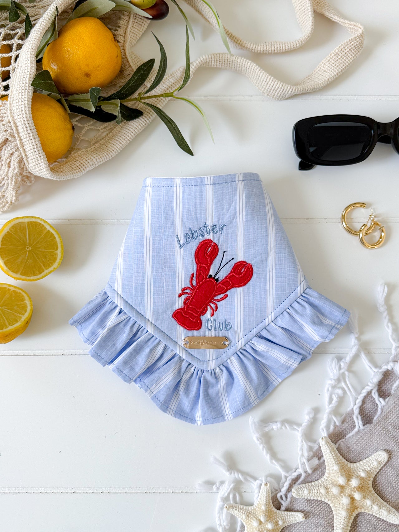 Dog Bandana featuring Lobster Club design with ruffled edges and blue striped fabric.