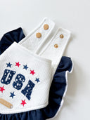 Dog Bandana featuring USA design with adjustable double snaps and ruffled edges for pets.